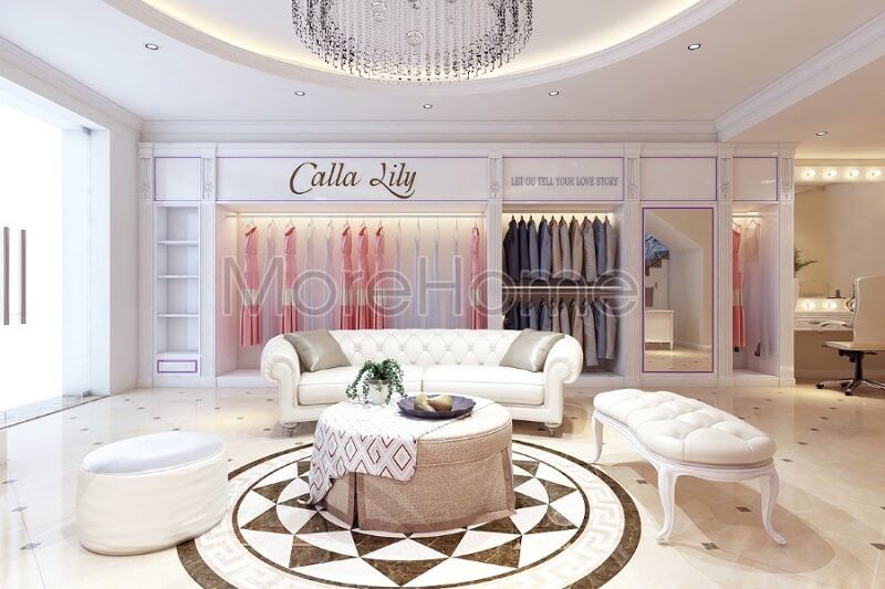 Mẫu thiết kế nội thất showroom áo cưới tinh tế với hệ tủ gỗ màu trắng cao cấp hài hòa trong tổng thể không gian màu trắng sang trọng